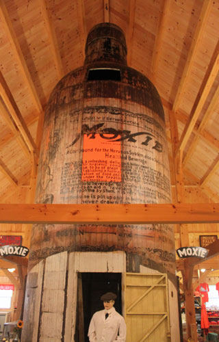 30-foot-tall wooden Moxie bottle, once used as a soda stand